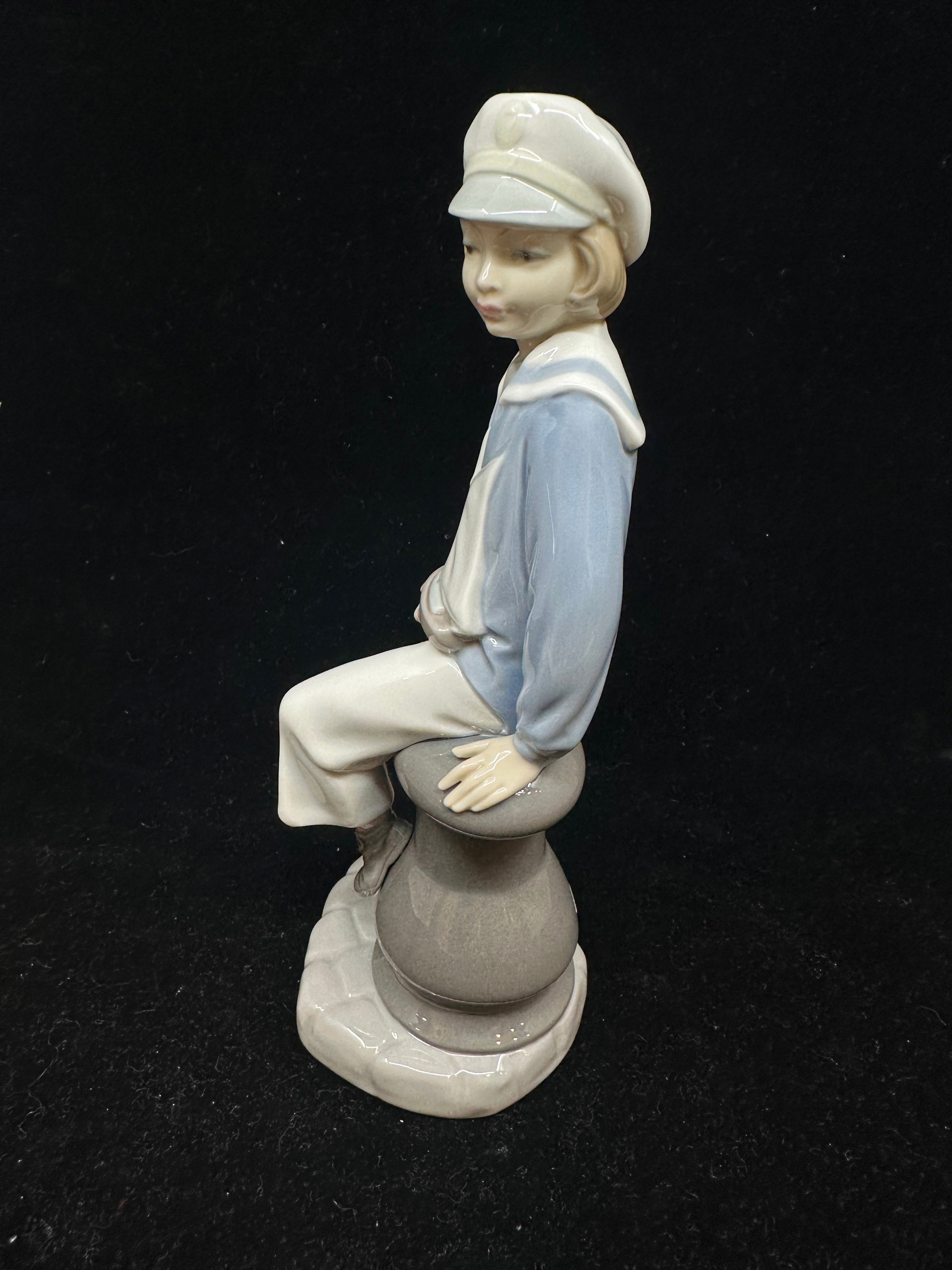 Lladro #4810 shops boy with a boat